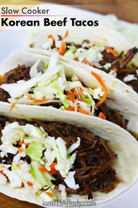 Oh my. Slow Cooker Korean Beef Tacos. Holy cow these are good.