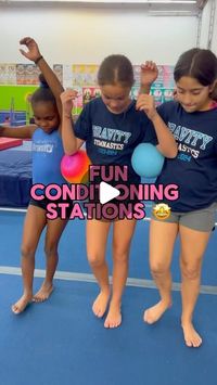 Gravity Gymnastics on Instagram: "We enjoy making conditioning fun for our grade school kids by using partners and props! Here are a few of our favorite exciting conditioning stations!  🌟 Snowman Stacker: Kids pair up to build a snowman! They are handing on the bar and not allowed to have their feet touch the floor. The kids pick up a foam block with their feet and pass it to their partner and the partner stacks the foam blocks with their feet!  ✔ Team Building ✔ Core Strength ✔ Grip Strength ✔ Strengthening Upper Body  🌟 Don’t Drop the Potato: The kids pair up - this can be done with 2 or 3 partners! The kid have to hold a ball between them at their hips - the kids are facing forward and have to make it to one end of the floor and back without dropping the potato! (you can use a ball or