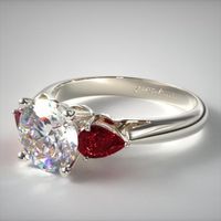 A timeless engagement ring featuring two beautifully matched pear shape rubies accenting the center diamond of your choice. All three stones are set in a wire basket with a slightly rounded, airline shank. James Allen Ring Style: 11157P #engagementrings #theknotrings #imengaged #weddingrings #marryme #weddingring #engagementring #proposal #isaidyes #showmeyourrings #diamondring #gettingmarried #jewelryaddict #shesaidyes #diamonds #ido #engaged #jamesallen #jamesallenrings