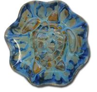 My collections of hand-sculptured Bowls, Platters, and Plaques are designed on the island of Maui Hawaii. The relief designs feature on my ceramics is Hawaiian-themes such as turtles, humpback whales, pineapples, fishes, and modern abstract colors. You can place these ceramics indoors or outdoors regardless of the climate. The glazes are non-toxic so you can serve hot or cold foods, delicious appetizers and will create a lovely presentation. Wire hook attached on the back. 3” x 16.5” $295.00