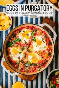 Eggs in Purgatory is a classic Italian dish where eggs are poached in a spicy tomato sauce. This easy recipe is perfect any time of day.