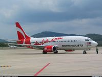 Engine started, ready to taxi out as a ThaiAsia flight. No pushback, no aerobridge and "elbow system" seating arrangement for this low-cost carrier. (Thanks Pieter for the term) - Photo taken at Phuket (HKT / VTSP) in Thailand on September 9, 2004.