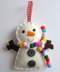 Little snowman with pompom scarf