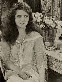 everybody's sweetheart - 1917 Olive Thomas in Indiscreet Corinne. Olive wears a lace negligee over her nightgown.