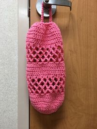 This is a very simple and quick project that will result in a pretty, handy storage bag to hold your plastic bags for recycling. Stash yarn would be perfect for this. Also perfect for those that participate in craft fairs. Make money and promote recycling. Enjoy!!