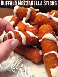 Buffalo Mozzarella Sticks | Crispy fried mozzarella sticks smothered in homemade…