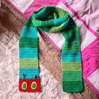 If you want to create an adorable crochet scarf this is the pattern for you. This digital download includes instructions on how to crochet a super cute scarf inspired by the children's book 'The Very Hungry Caterpillar' This pattern is beginner-friendly and very straightforward. This is a Digital Product, not a physical product  If you need any help don't hesitate to message me with your questions, either through socials linked at the bottom of this page or through my contact page.