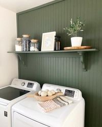 A modern laundry room remodel.  Check out how this laundry room got a facelift and became more functional with an Ikea hack.  #ikeahack #laundryroom #laundryroomdecor