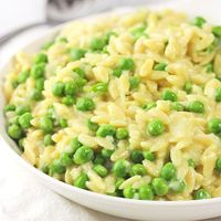 This Creamy Orzo With Peas and Parmesan Cheese is an easy and delicious all-in-one side dish that goes with just about anything!