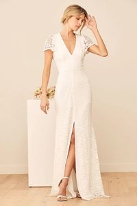 Lulus Exclusive! Create a picture-perfect moment with the Lulus Your Hand in Mine White Lace Flutter Sleeve Maxi Dress! This simple and elegant maxi features a floral lace overlay (atop a white knit lining) that shapes a V-neckline and a princess-seamed bodice, framed by sheer, fluttering short sleeves. A high, fitted waist falls to a flowy maxi skirt with a front slit. Wear your hair up to show off an open back with two fabric-covered button closures at the neck. Hidden back zipper/clasp.