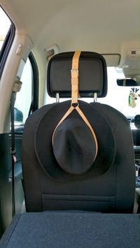 You can protect your hat while you are driving. Just put it on your car headrest as a belt and it is done. It is a handmade genuine leather hat accessory. Easy to use and looks great - even with your name or initials. cowboy hat car charm, cow boy hat car, cowboy hat stand, hat organizer, hat storage, car accessory,