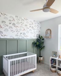 Create a modern-rustic nursery with this safari wallpaper! It pairs perfectly with board + batten walls. Room by: @stefaxe