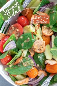 12 Minute Spinach Salad is a quick and easy healthy salad with bagel chips and a homemade tangy salad dressing! #spinachsalad #healthy #quicksalad #healthysalads #newyear