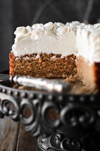 This high altitude carrot cake cheesecake is THE dessert to make. It has a salted graham cracker and pecan base, with a layer of moist carrot cake baked right on top of the crust. The cake is then finished with no bake vanilla bean cheesecake filling, piped on top in beautiful swirls for an elegant presentation. Make this for Easter, Thanksgiving, or any special holiday or birthday celebration.