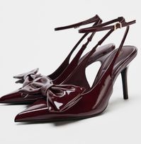 New With Tag Zara 2024 Collection Slingback Shoes With Thin Heels. Faux Patent Leather. Bow Detail At Front. Buckled Ankle Strap Closure. Heel Height: 3.9 Inches ( 10 Cm) Burgundy Red |2241/410 Upper 100% Polyurethane Lining 83% Polyester 12% Elastane 5% Polyurethane Sole 100% Polyurethane Thermoplastic Insole 100% Polyurethane