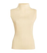 Pleats Please Issey Miyake beige Sleeveless New Colorful Basics Top. Shop with free returns and earn Rewards points for access to exclusive benefits.