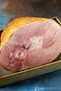 This is a complete guide on how to cook a ham. With detailed information on preparation methods, cooking times, ham glaze ideas and tips and tricks for success, you'll be able to turn out a perfect holiday ham year after year!