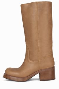 Mid-calf heeled boot Fits true to size Measurements taken from a size 7 2.5" Heel, 0.75" Platform Leather Upper, Leather / Fabric Lining, Synthetic Sole