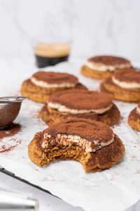 Tiramisu cookies on a cooling rack.