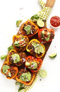 HEALTHY Spanish Quinoa Stuffed Peppers! 10 ingredients, packed with protein and fiber, and SO flavorful! #vegan #glutenfree #recipe #healthy #dinner #minimalistbaker