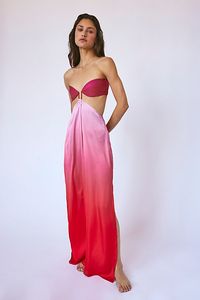 So stunning and strapless, this sleek maxi is featured in a colorful satin fabrication and slim-fitting silhouette with a bandeau-inspired top and side-slit detail. **Fit:** Slim-fitting, maxi-length **Features:** Soft satin fabrication with colorful detail, bandeau-inspired top with U-shaped wire at bust, cutouts at the waist, open-back with hook closure, slits at both legs **Why We | Baobab Voila Dress at Free People in Pink, Size: US 7