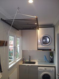 Hanging clothes drying rack