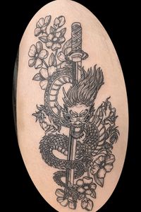 Black and grey linework dragon with katana and floral background