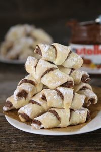 These rugelach cookies also referred to rogaliki are filled with a nutella (hazelnut) chocolate spread that works wonderfully for baking.