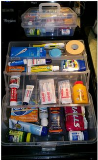 COLLEGE MEDICINE KIT~ Clear storage tackle box style. CONTENTS: bandaid tape, bandaids, thermometer & slip covers, tums, small empty pill bottle, chapped lips meds, antibiotic ointment, thick healing lotion, excedrin, tylenol, motion sickness less drowsy pills, eye wash, athlete's foot powder, vasaline, melatonin, anti-diarrheal pills, cough drops, & daytime cold pills. The box has a handle & is small & compact & so are ea of the items inside, so it easily closes.