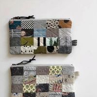 Svetlana Skumanicova on Instagram: "Tiny scraps of fabric (2” x 1.5”) in a 4x5 grid make for the most adorable zipper pouches. What do you think? Pretty fun, right?

#sotakhandmade #patchwork #quiltedpouch #patchworkpouch #tinypatchwork #zipperpouch #handmadepouch #pencilcase #modernpatchwork"