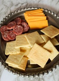 These crackers are the perfect canvas for your favorite dips, spreads and toppings. They are buttery and super flaky plus they come together in a snap with only 4 ingredients! #ketosnacks #ketorecipes #ketocrackers #lowcarbcrackers #lowcarbsnacks #lowcarbrecipes #keto #lowcarb #glutenfree #glutenfreerecipes #glutenfreecrackers #glutenfreesnacks