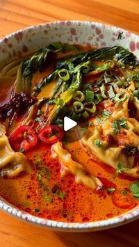 Zainab Pirzada on Instagram: "Thai red curry dumpling soup will make you feel better

2 tbsp vegetable oil 
1 tbsp Thai red curry paste 
1.5 cups of water 
0.5 cup of coconut milk 
1 tsp soy sauce 
1.5 tbsp fish sauce 
1 tbsp sugar 
1 pak choi, cut in half 
10-12 frozen dumplings 

Toppings:
Chilli oil 
Coriander
Spring onions
Lime juice

#easyrecipes #dumplings #thairedcurry #soup #dumplingsoup #recipe"