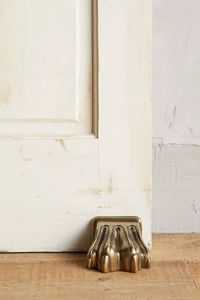 Antiqued Claw Doorstop | Anthropologie