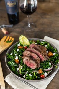 Enjoy a healthy take on fall flavors with this marinated spinach and kale steak bowl.