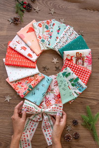 Step into a winter wonderland with ‘Christmas in the Cabin’ by AGF Studio. This retro collection channels the 1940s, evoking a nostalgic, cozy holiday spirit. This fabric collection features 16 quilting cotton, Fabric Wonders: Fat Quarters, 10 inch squares, 1 Flannel Substrate 1 2.5 Edition Binding. Perfect for Quilts, Table Runners, DIY Accessories, Apparel and more! Shop now and begin your next sewing adventure! #Quilting #Sewing #Handcrafted #FabricCrafts #OekoTex #PreCutFabrics #TextileCraft