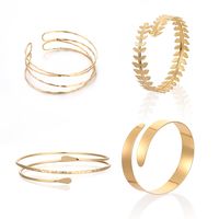 PRICES MAY VARY. 【Simple and stylish design】This 18k gold-plated gold accessories for women showcases a simple yet sophisticated style. These gold bangles for women add an understated yet eye-catching touch to your look with minimalist elegance 【Comfortable upper arm fit】The thin design of arm jewelry upper arm comfortably wraps around your upper arm just above the elbow, creating a stylish gold cuff while ensuring a comfortable wearing experience all day 【Suitable for all occasions】Whether it is daily wear or a special occasion, these cuff bracelets for women add a touch of elegance to any look. These gold arm cuffs are perfect for being the highlight of your look 【Perfect layering】These arm cuffs can be worn layered with bracelets for women or as a focal accessory alone. Greek goddess ac