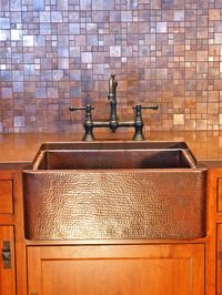 Copper Tile - 30 Splashy Kitchen Backsplashes on HGTV I like the backsplash, but not the sink.