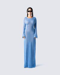 Move with a type of confidence they will all be envious of in this blue sweater knit maxi dress 💙 Crafted with crochet knit - this piece features a high front neckline, low scoop back, and flared long sleeves. Show them what you got in the most comfortable, yet elegant way 😇