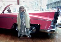 Two original Thunderbirds puppets, Lady Penelope and her chauffer Parker with the FAB 1 Rolls Royce, are on display in a window in Central London 2002. The cult TV figures were star lots in an auction called “At The Movies,” a celebrity, film and entertainment auction, held Apr. 23, 2002