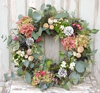 My homemade Christmas wreath for 2015 with eucalyptus, pine, poppy heads and hydrangeas.