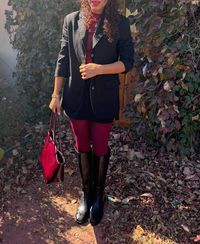 Are you looking for some knee high boot outfit ideas? My Chic Obsession is here to help! Try this burgundy outfit that's perfect for fall. Pair knee high boots with burgundy tights, mini skirt, burgundy tee, and blazer. Add a burgundy handbag to complete the look!