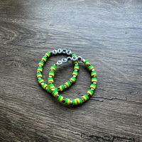 Introducing our delightful lemon and lime matching bracelet set, crafted with love from clay beads! These vibrant accessories are designed to celebrate the unbreakable bond of best friends. Each bracelet features a unique combination of zesty lemon and refreshing lime beads, symbolizing the perfect balance and harmony in your friendship. The smooth texture and lightweight feel ensure comfortable wear throughout the day. The earthy tones of the clay beads add a touch of nature's beauty to your en