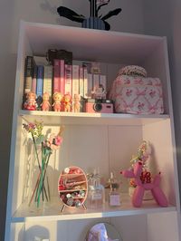 Current bookshelf   #books #makeup #lego #legoflowers #perfume #girlsroomideas #girlroom #room #pink #flowers