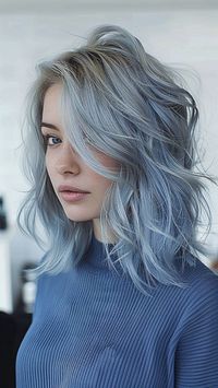 Dive into a world of ethereal beauty with bluish-silver hair showcased in these 25 trendy styles for an enchanting transformation. Whether you prefer a subtle hint of blue or a bold, icy hue, embrace the magical allure of bluish-silver tones to elevate your look. Click to explore more #BluishSilverHair inspiration and follow us for daily hair trends! #HairColor #TrendyStyles #HairGoals #HairInspiration