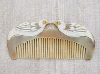 This beautiful comb is handcrafted 100% from natural buffalo horn material, hand-carved 2 kissing birds. Dimension: 13 x 6 cm. Finish: polish Each piece of natural horn has its own color variation which make it unique. We will send a color similar to this item or similar to your choice. If you want please just request for a photo before shipping to make sure you can receive exactly the one you like, your satisfaction is our happiness. Have a happy shopping time! See you again soon! With kindest