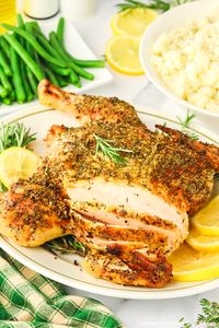 This juicy Spatchcock Chicken recipe features a simple technique that anyone can master. #roastchicken #easychickenrecipes #bakedchicken #spatchcockchicken