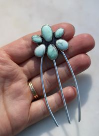 Hair Fork Details: This mini hair fork is a take on the traditional hair fork and created to be placed in hair that is already tied up.  It will work great for all types of hair including thinner or shorter hair. This hair fork is made entirely of sterling silver and features six Palomino Turquoise stones. The hairpin is 3 1/2" in total length.  The backside is stamped with "The Haute Bohemian" logo and .925 hallmark. The bottom of the hair fork is pointy so please be careful when putting the hair fork in hair.  The hair fork may bend when arranging in hair.  It can be shaped back to its original shape by gently bending it.  Caring for Sterling Silver Jewelry: Air exposure can tarnish sterling silver jewelry. Try to not leave it out where it can be exposed to air.  It's best to store silve