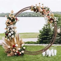 PRICES MAY VARY. Round Wooden Wedding Arch Introducing the Round Wooden Wedding Arch - the perfect rustic decoration for your special day! This chic and modish arch is made from high-quality wood and metal, and features a natural natural brown wood color and texture. It is the perfect addition to any countryside, boho-chic, farmhouse, barn style, woodland, or rustic themed event decor. The arch is made of sturdy wood construction and can be decorated with lights, flowers, or other decorations to