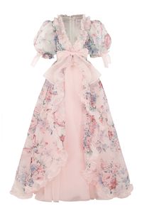 The Cotswolds Marie Gown features over-the-top sleeves, a whipped cream ruffle hem and three layers of luxurious pleated skirt. The skirt is designed after Marie Antoinette's famous curtain style gowns, which open in the front. This print was designed to conjure up the Cotswolds, a region in England that is designated