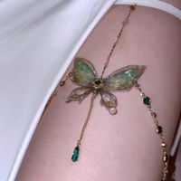 This Green Fairy Butterfly Thigh Chain is perfect for adding a touch of delicacy and beauty to any outfit. Crafted from lightweight materials, this chain is comfortable and easy to wear. Its intricate design and shimmering green color will bring a touch of elegance and style to your look. 🦋More Grape JiangNan Product👈 Product DetailMaterial: CopperingElastic Strap(Perimeter): 46~54cmTech: HandmadeStyle: ChicOccasion: Bar/Party/Weekend Casual/Going Out Product Note: 1. All pictures are taken in